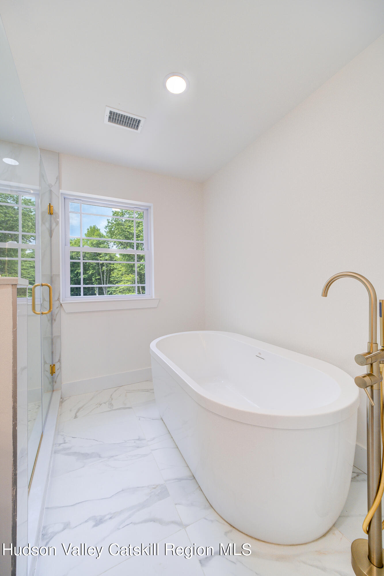 3 Calico Way, Unit WAYS Wallkill, NY 12589 - Photo 53 of 68 a white bath tub sitting in a bathroom