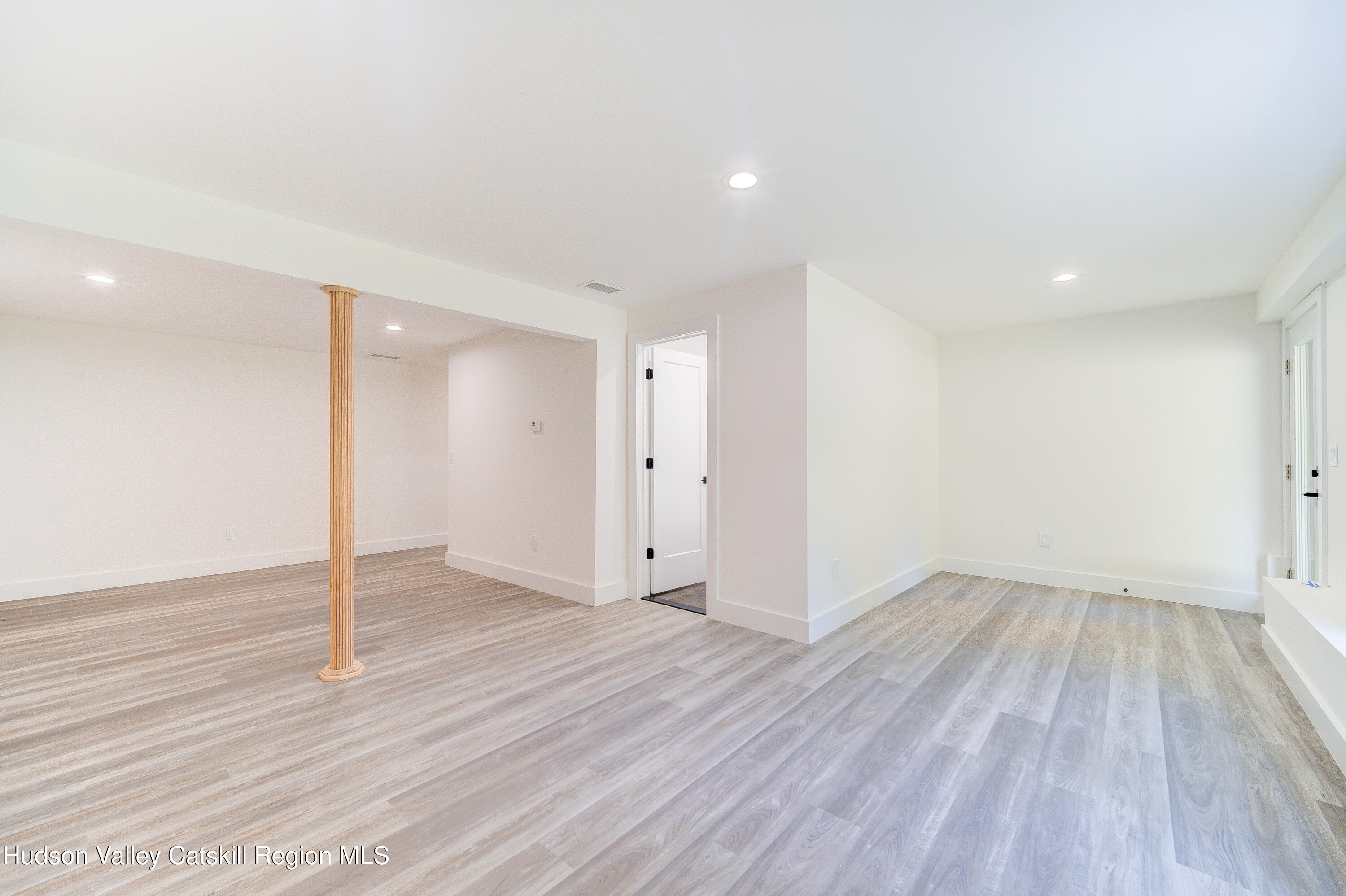 3 Calico Way, Unit WAYS Wallkill, NY 12589 - Photo 58 of 68 a view of an empty room with wooden floor