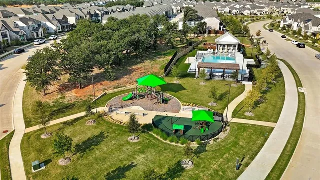 an aerial view of a house with a garden