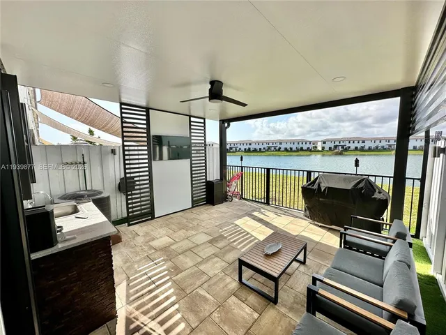 a bedroom with furniture and window