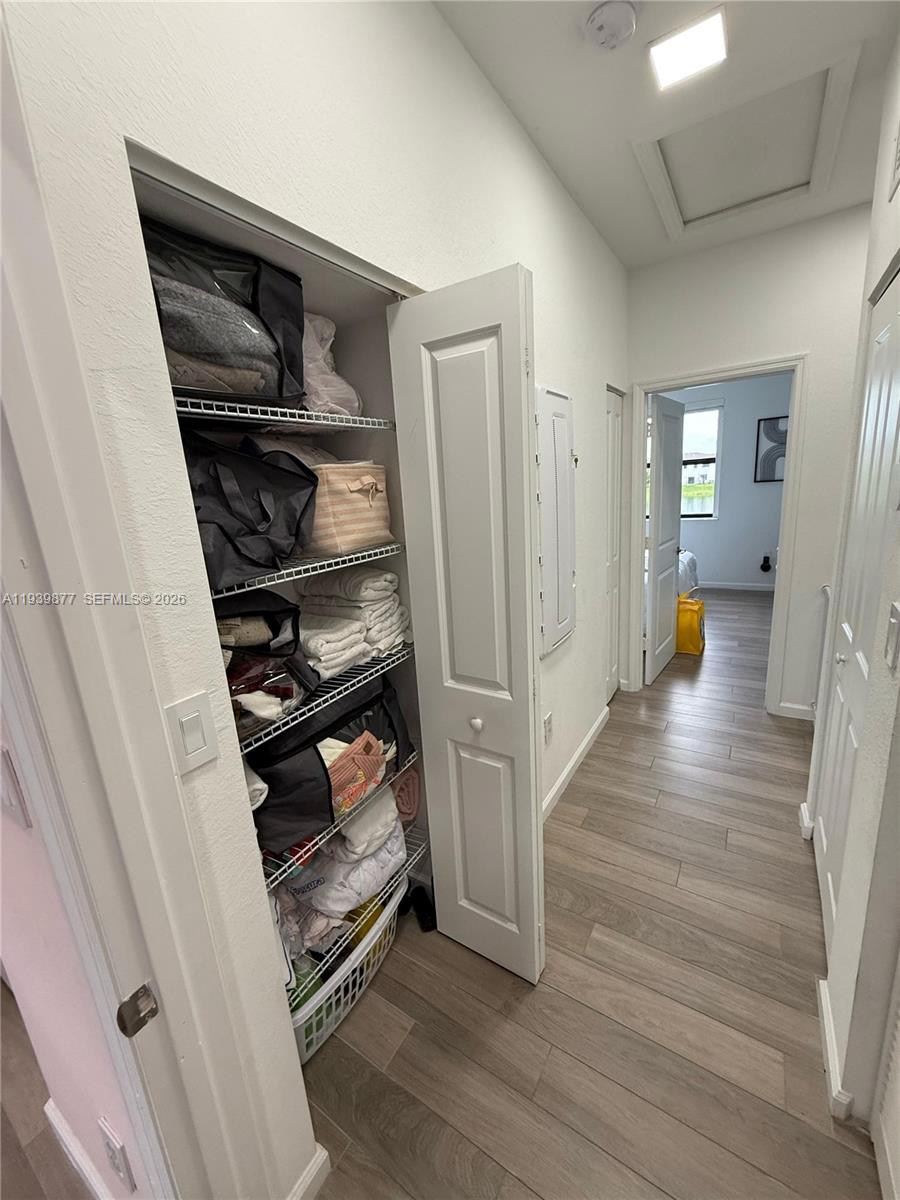 10066 Southwest 228th Terrace Miami, FL 33190 - Photo 18 of 42 a kitchen with a refrigerator and a stove top oven
