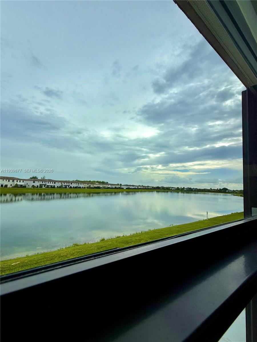 10066 Southwest 228th Terrace Miami, FL 33190 - Photo 38 of 42 a view of outside space with a lake view