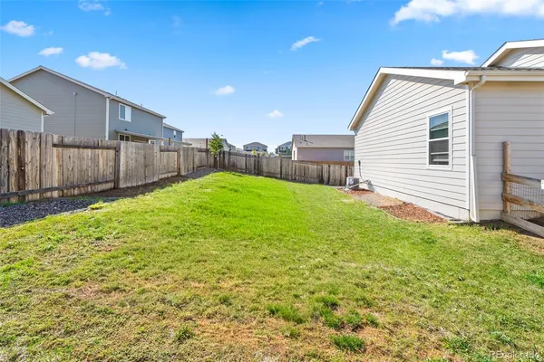 a bathroom with a sink and a yard