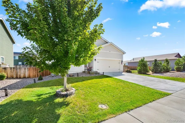 a house with swimming pool in front of it