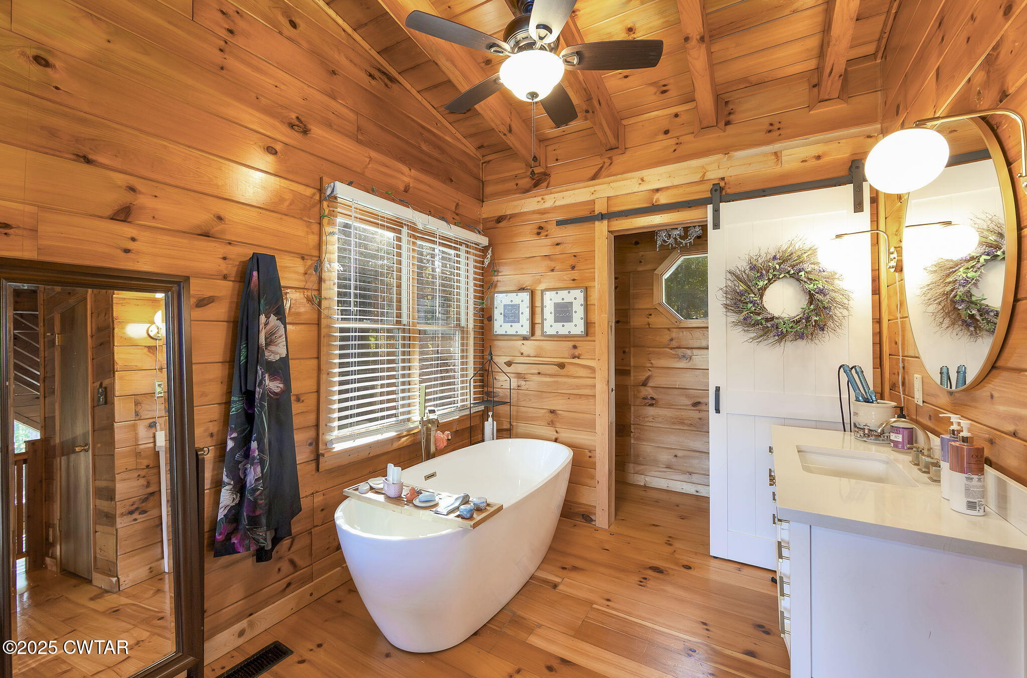 4358 Beech Bluff Road Beech Bluff, TN 38313 - Photo 11 of 17 a bathroom with a sink bathtub and next to a window