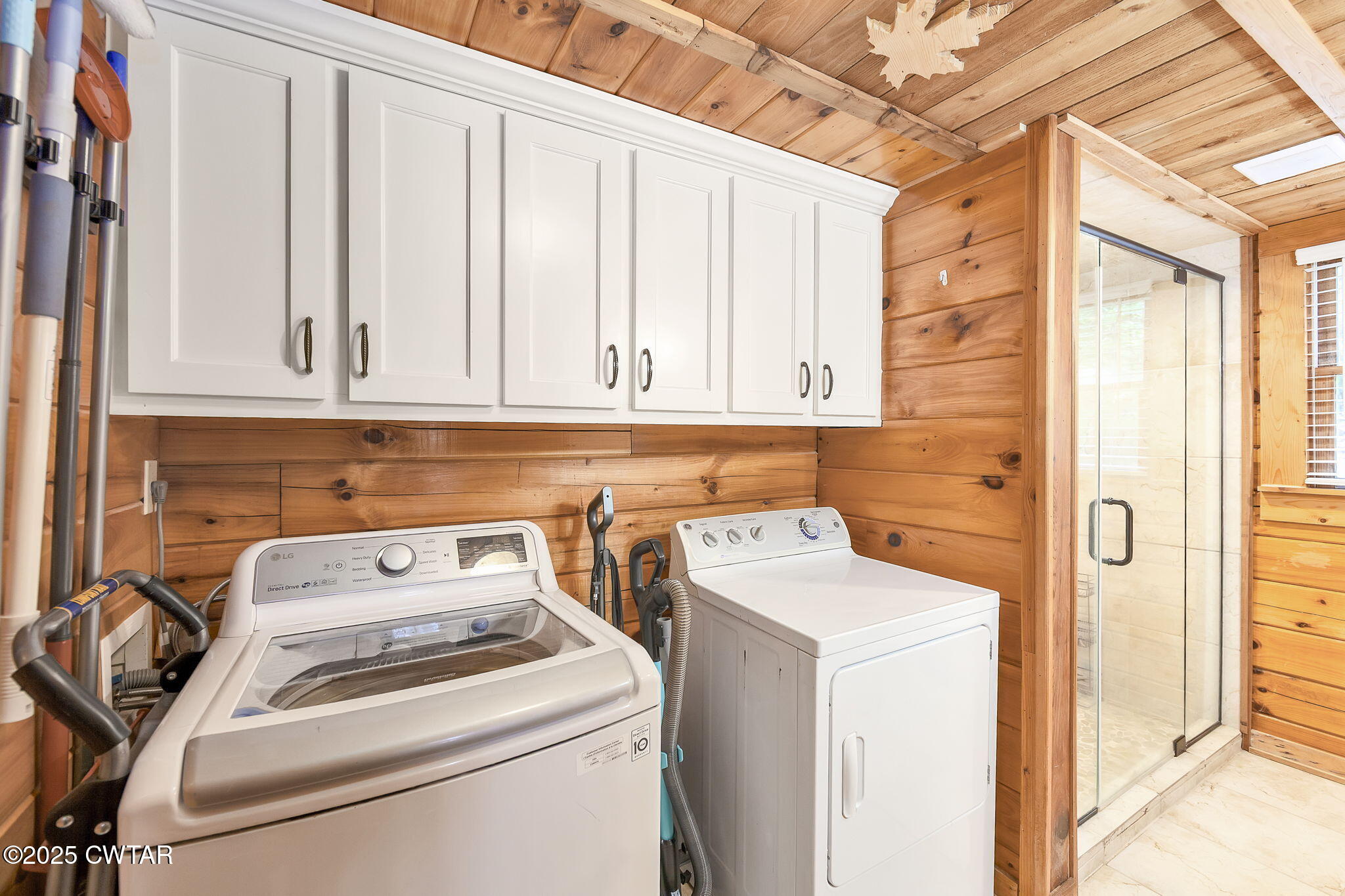4358 Beech Bluff Road Beech Bluff, TN 38313 - Photo 12 of 17 a utility room with dryer and washer