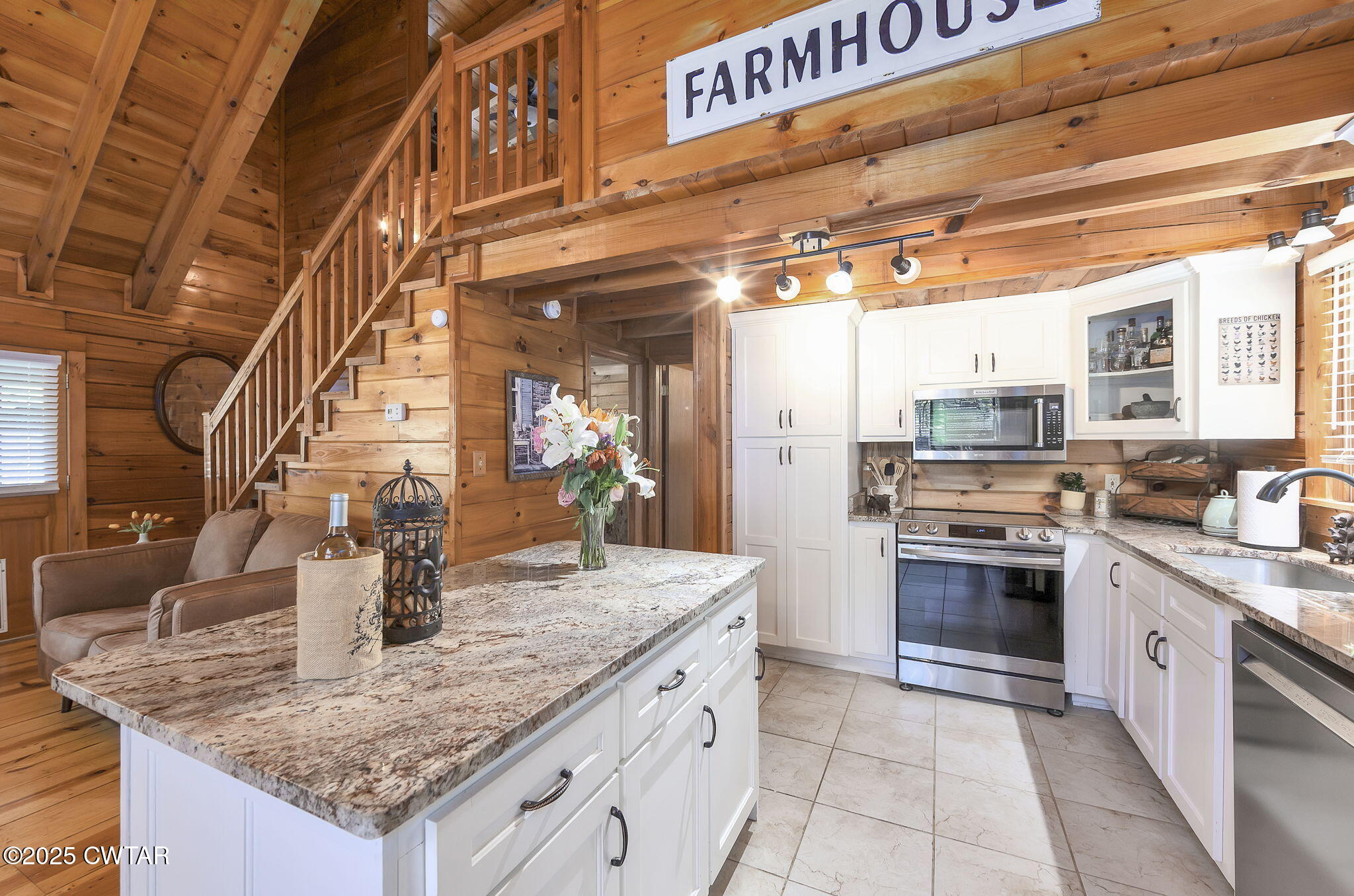 4358 Beech Bluff Road Beech Bluff, TN 38313 - Photo 6 of 17 a kitchen with stainless steel appliances granite countertop a sink and stove