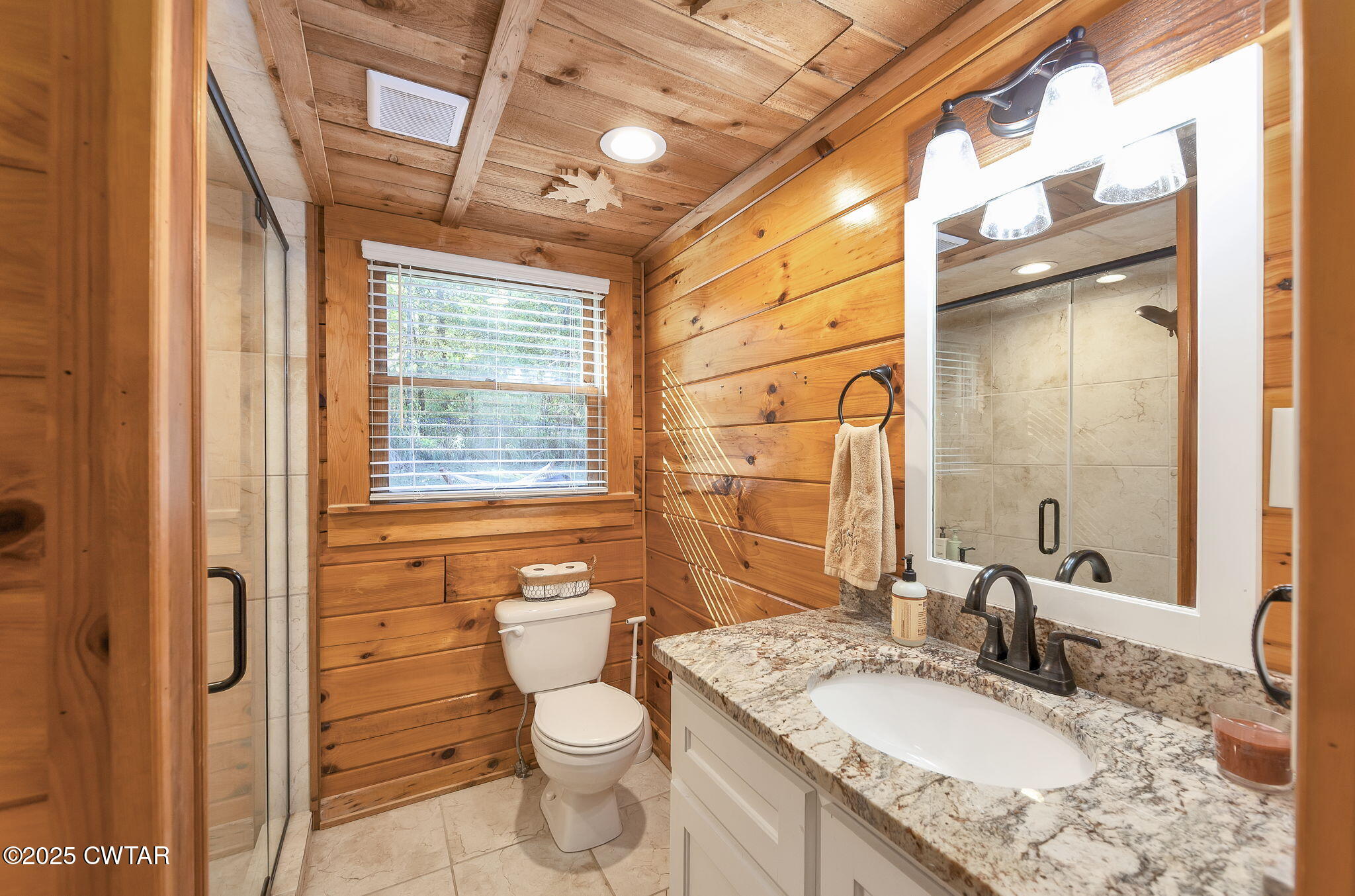 4358 Beech Bluff Road Beech Bluff, TN 38313 - Photo 9 of 17 a bathroom with a granite countertop sink toilet and shower