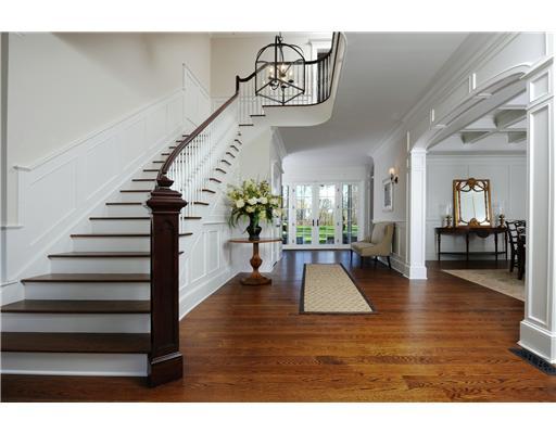 21 Searles Road Darien, CT 06820 - Photo 3 of 20 a view of entryway and hall with wooden floor