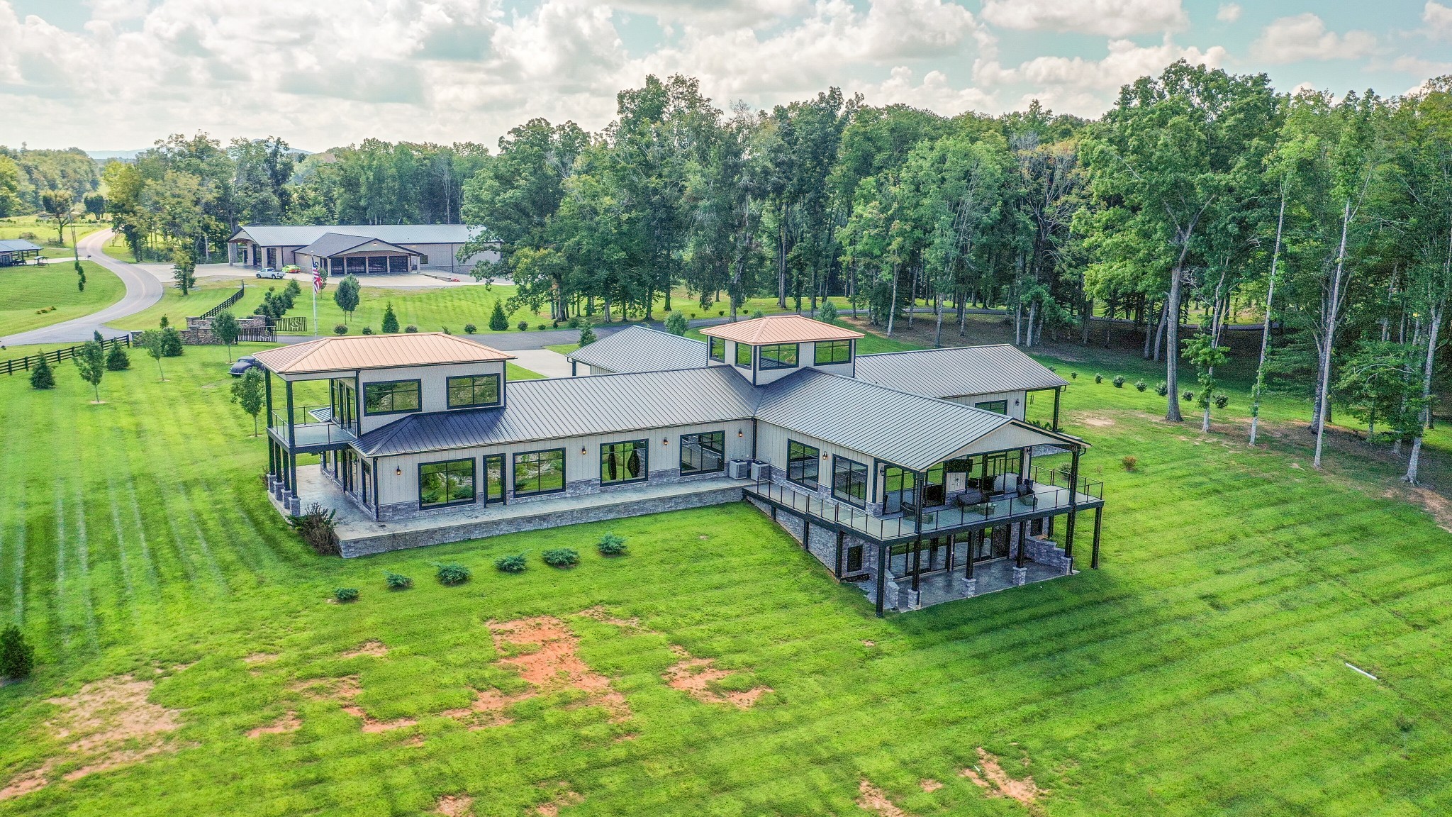 5156 Turney Groce Road Byrdstown, TN 38549 - Photo 52 of 68 aerial view of a house with a big yard and large trees