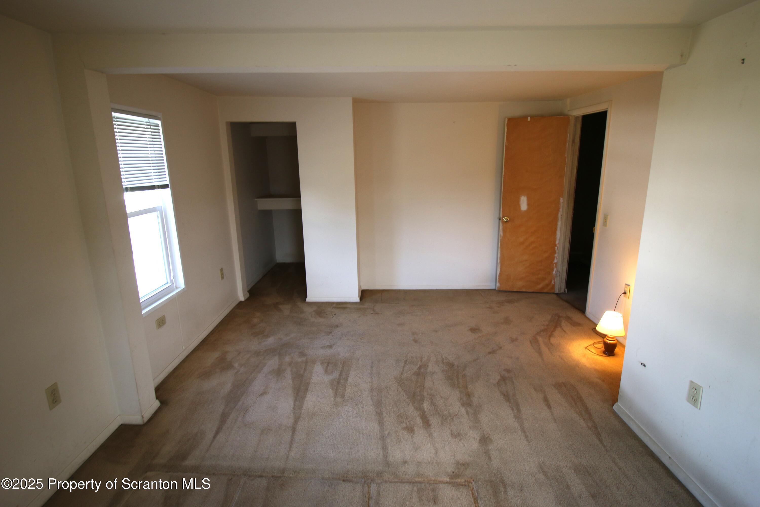 352 North Fillmore Avenue Scranton, PA 18504 - Photo 16 of 16 a view of livingroom with an empty space and a window