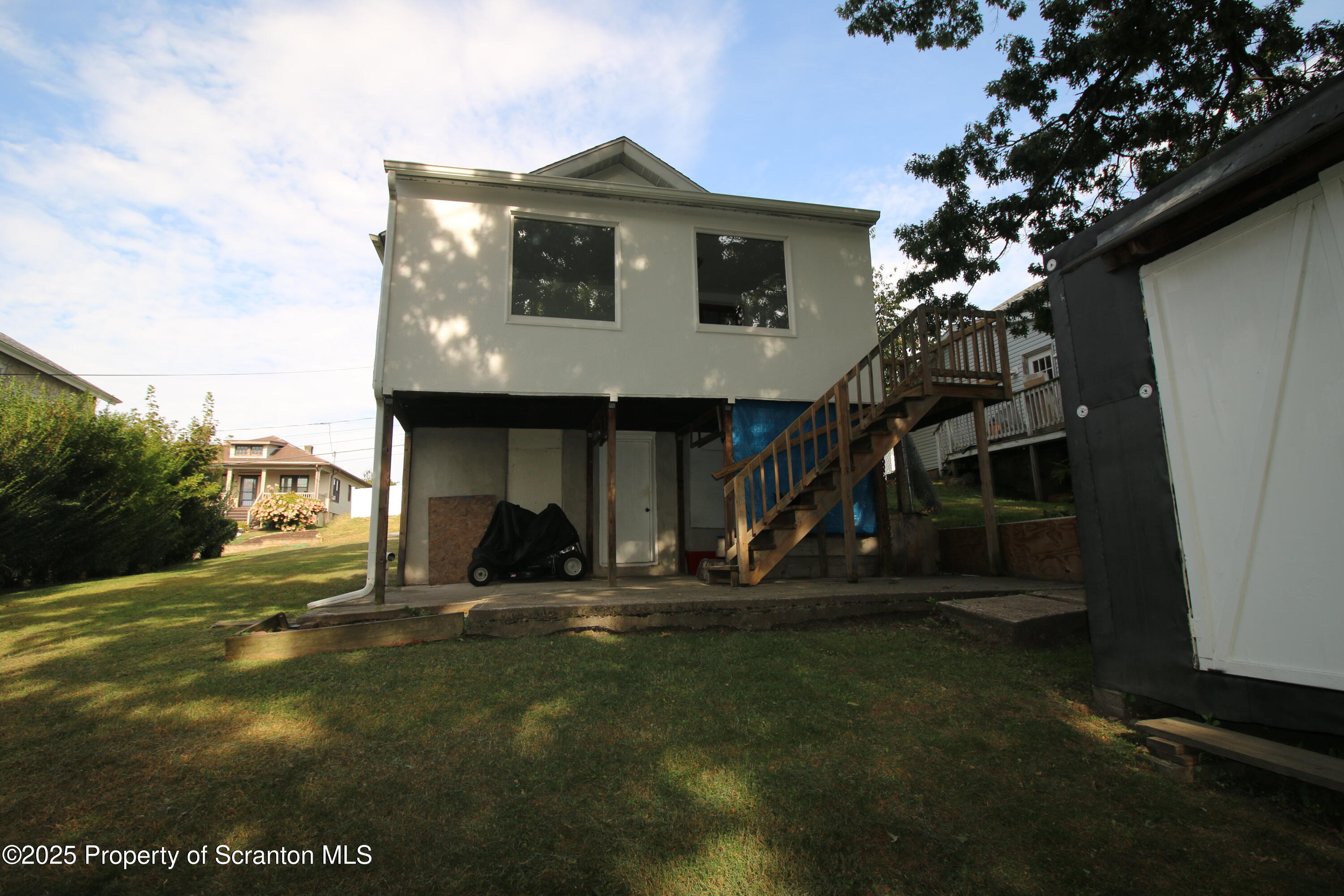 352 North Fillmore Avenue Scranton, PA 18504 - Photo 3 of 16 a front view of a house with a yard