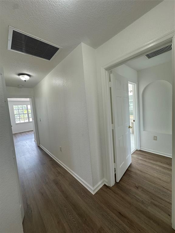 13376 Southwest 47th Street Miramar, FL 33027 - Photo 17 of 38 a view of entryway with wooden floor