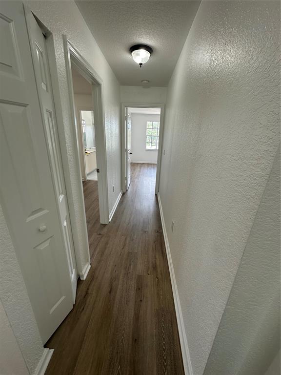13376 Southwest 47th Street Miramar, FL 33027 - Photo 25 of 38 a view of a hallway with wooden floor