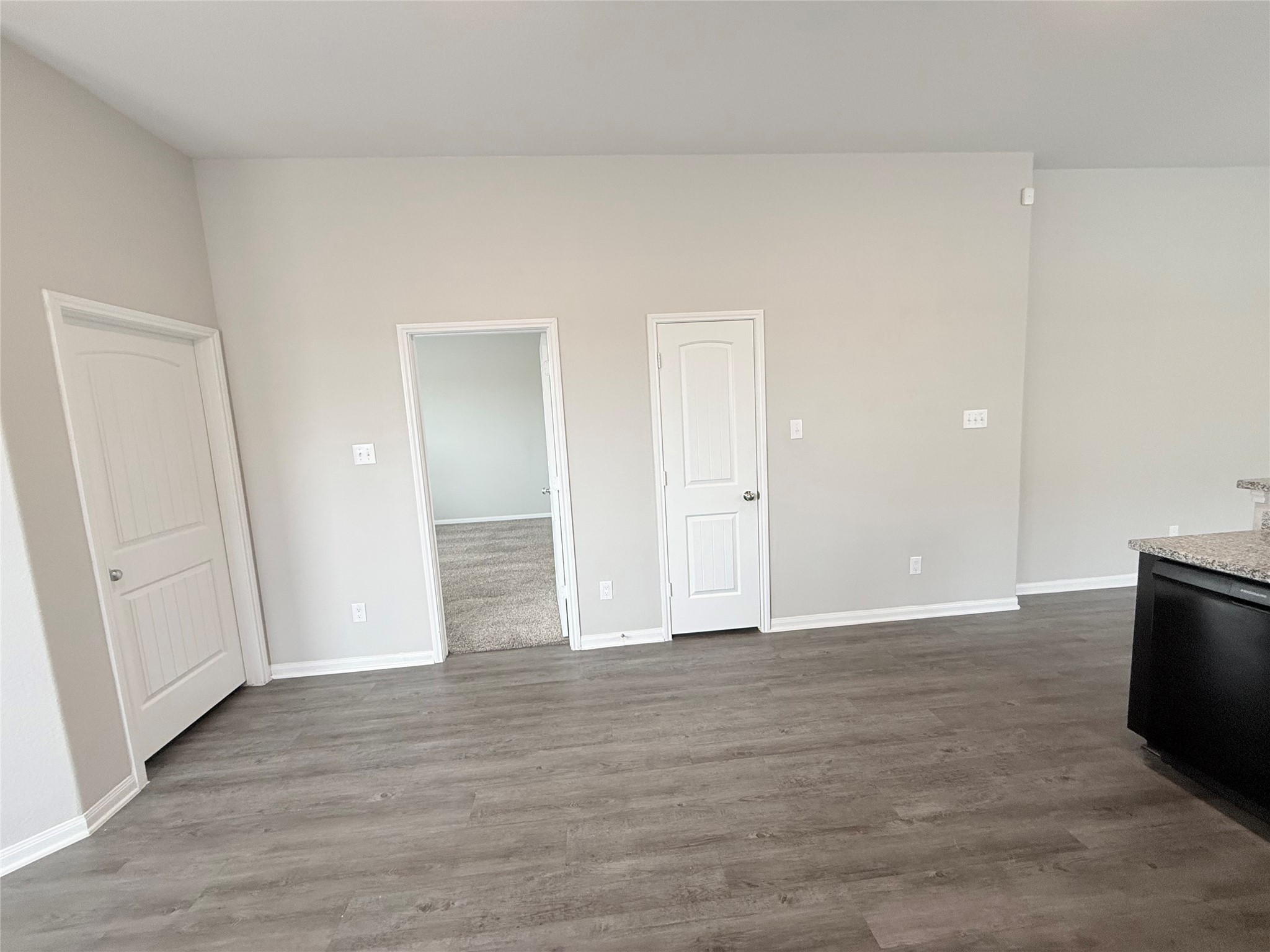14501 Sugar Pines Drive Conroe, TX 77302 - Photo 23 of 46 a view of an empty room and wooden floor