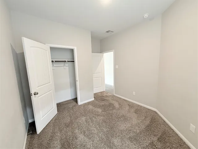 a view of a livingroom and a window