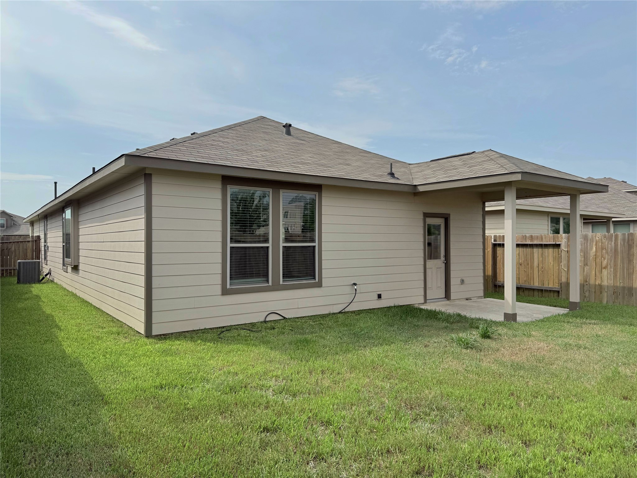 14501 Sugar Pines Drive Conroe, TX 77302 - Photo 42 of 46 a front view of a house with a yard