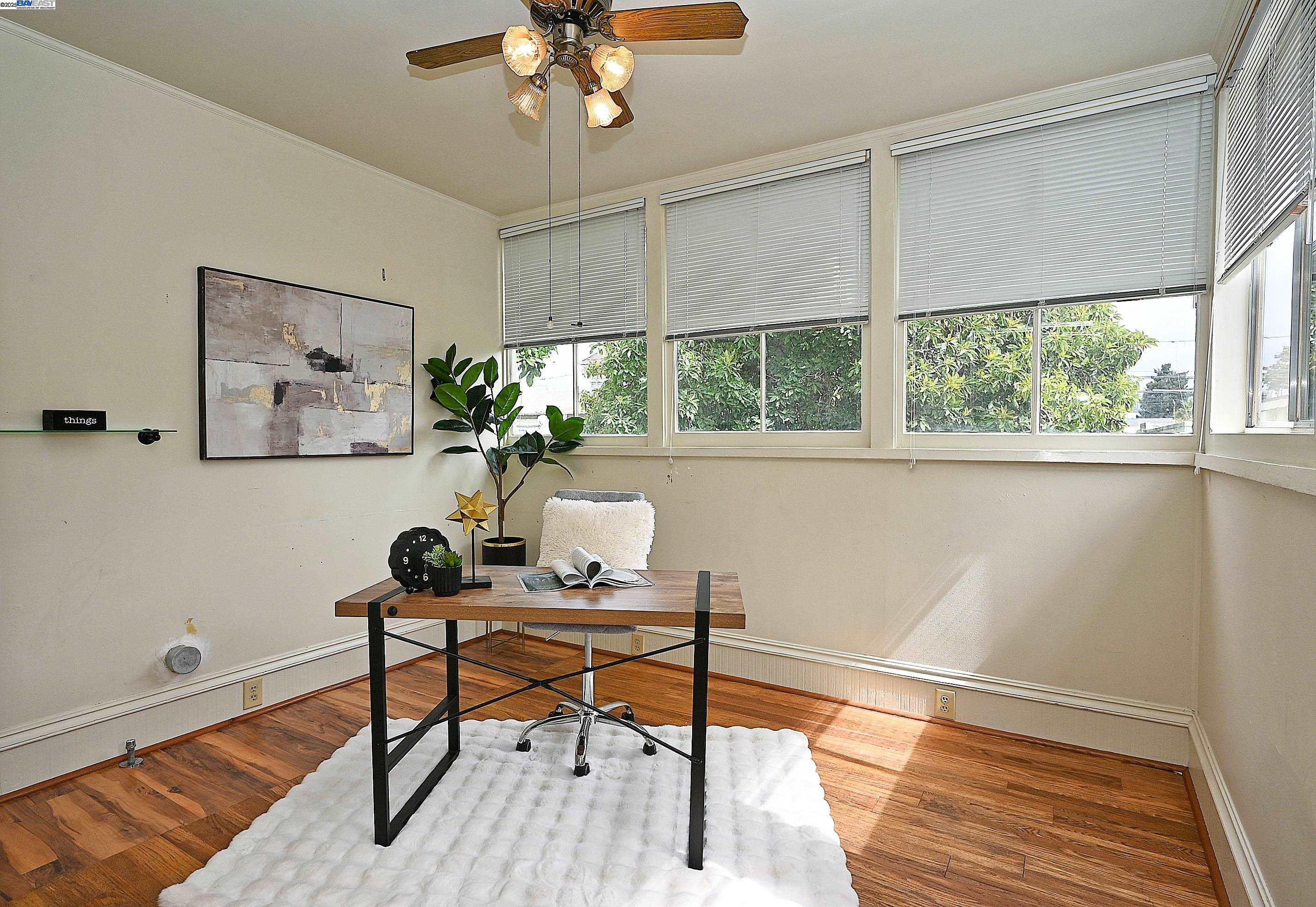 1613 Union Street Alameda, CA 94501 - Photo 15 of 28 a work room with furniture and a window