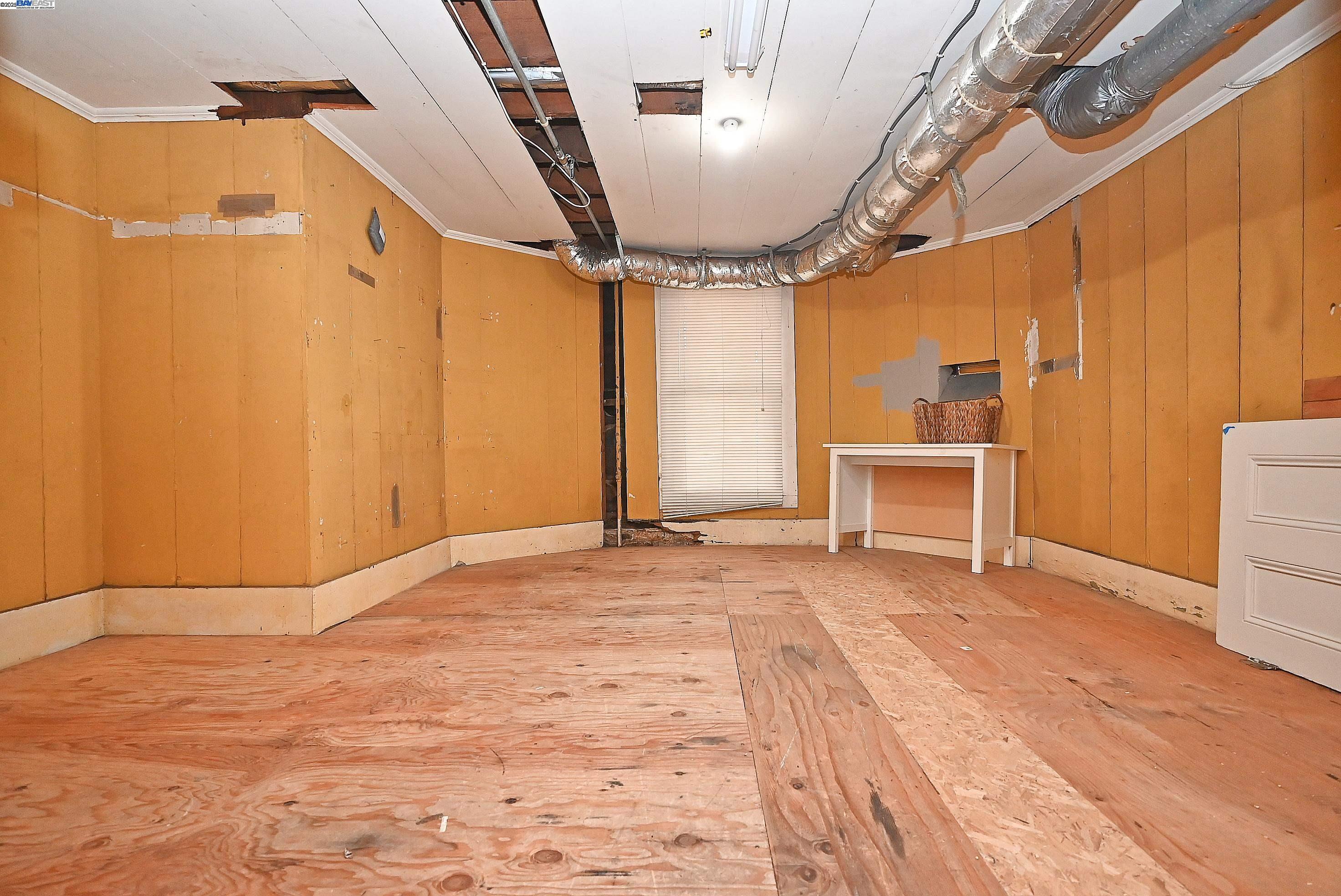 1613 Union Street Alameda, CA 94501 - Photo 21 of 28 a view of an empty room with a window