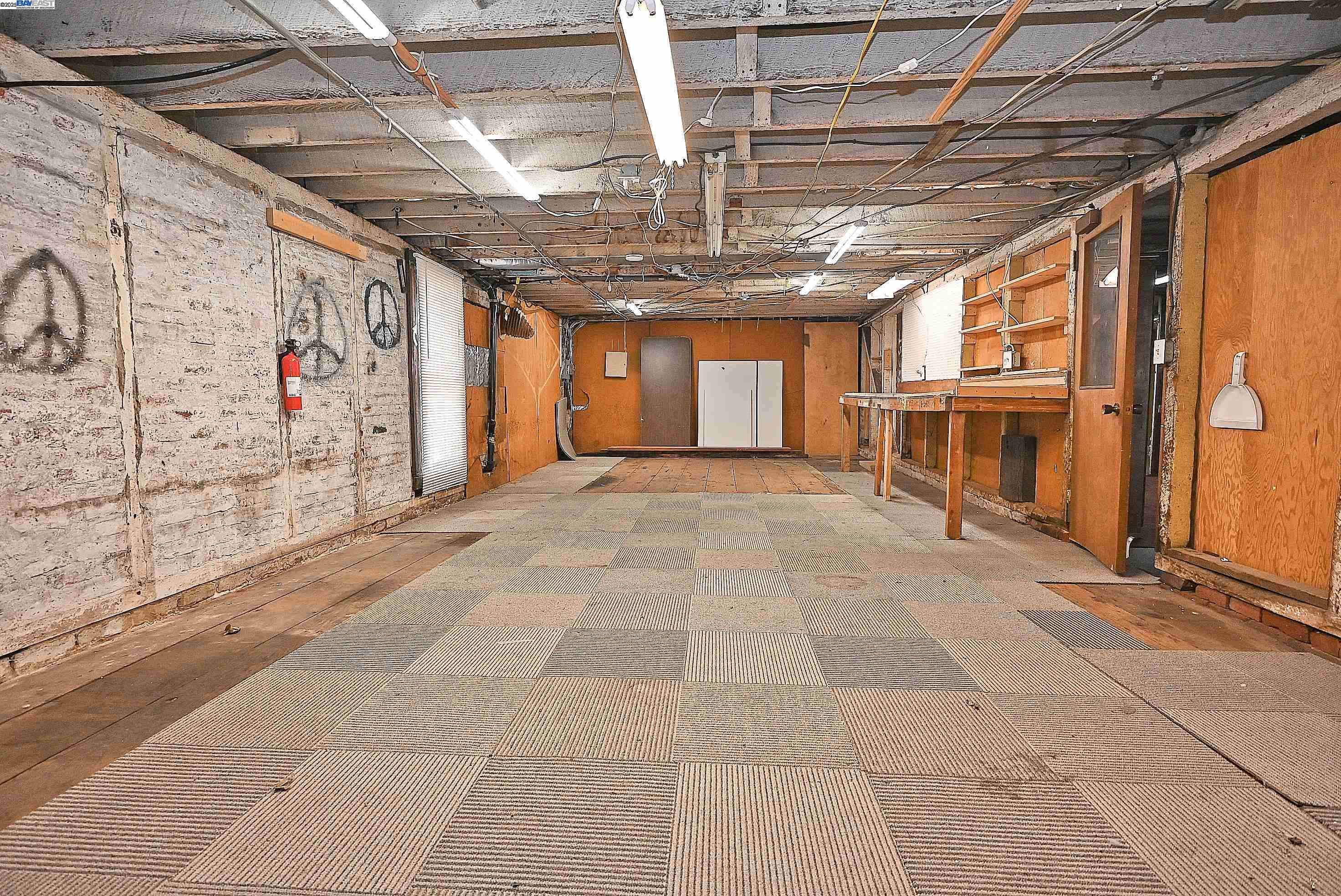 1613 Union Street Alameda, CA 94501 - Photo 22 of 28 a view of an empty room with a garage