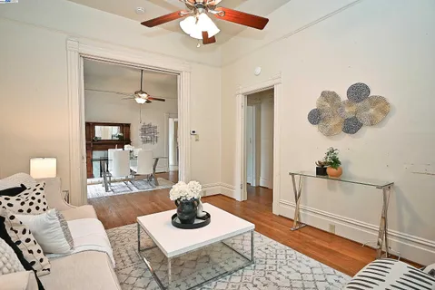 a living room with furniture and a rug