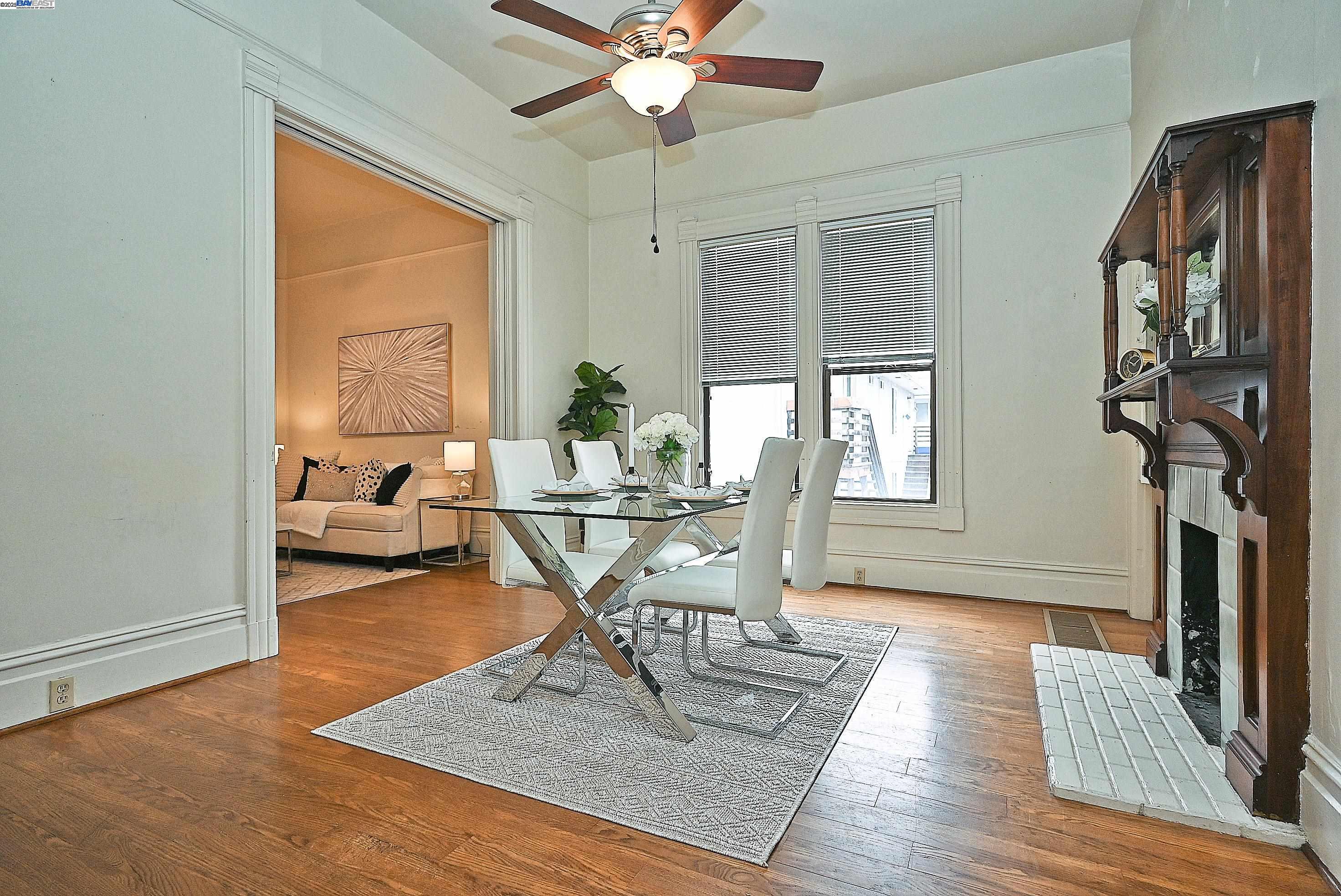 1613 Union Street Alameda, CA 94501 - Photo 9 of 28 a living room with furniture and a table