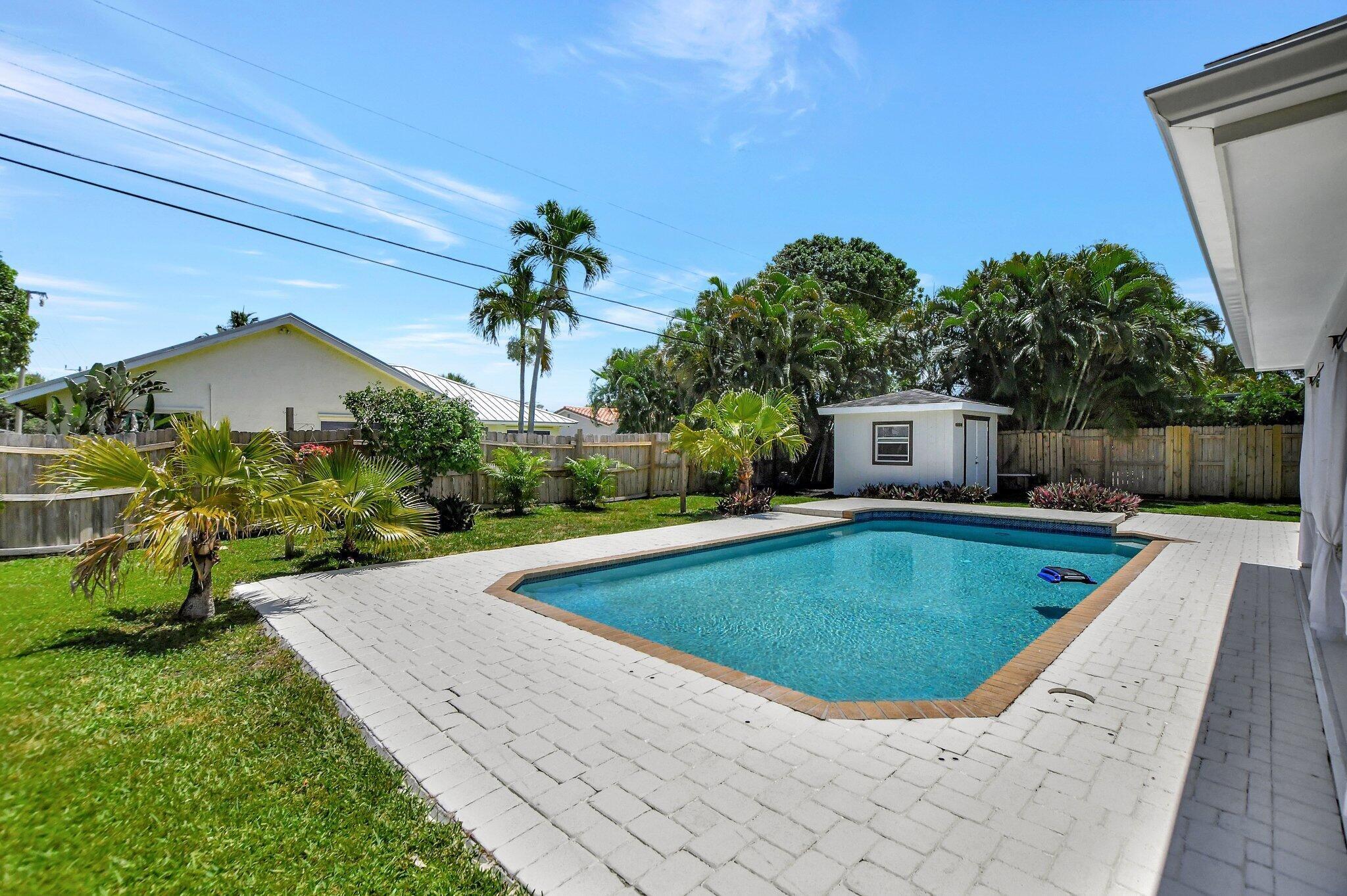 832 Southwest 10th Avenue Boca Raton, FL 33486 - Photo 40 of 57 a view of outdoor space yard swimming pool and patio
