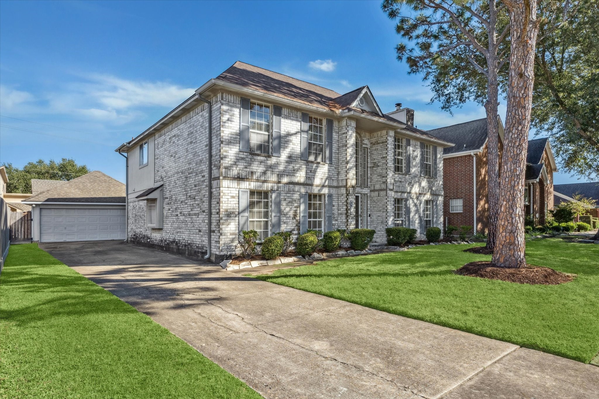 6523 Inverness Way Pasadena, TX 77505 - Photo 2 of 15 a front view of a house with a garden
