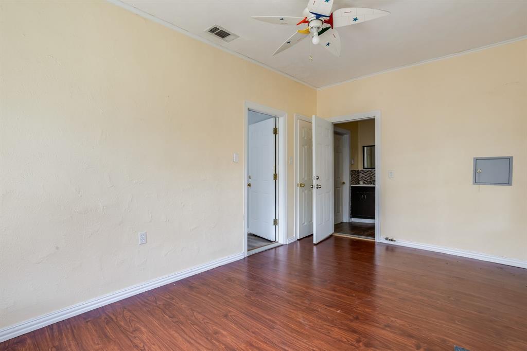 644 North Tyler Street Dallas, TX 75208 - Photo 20 of 33 a view of an empty room with wooden floor