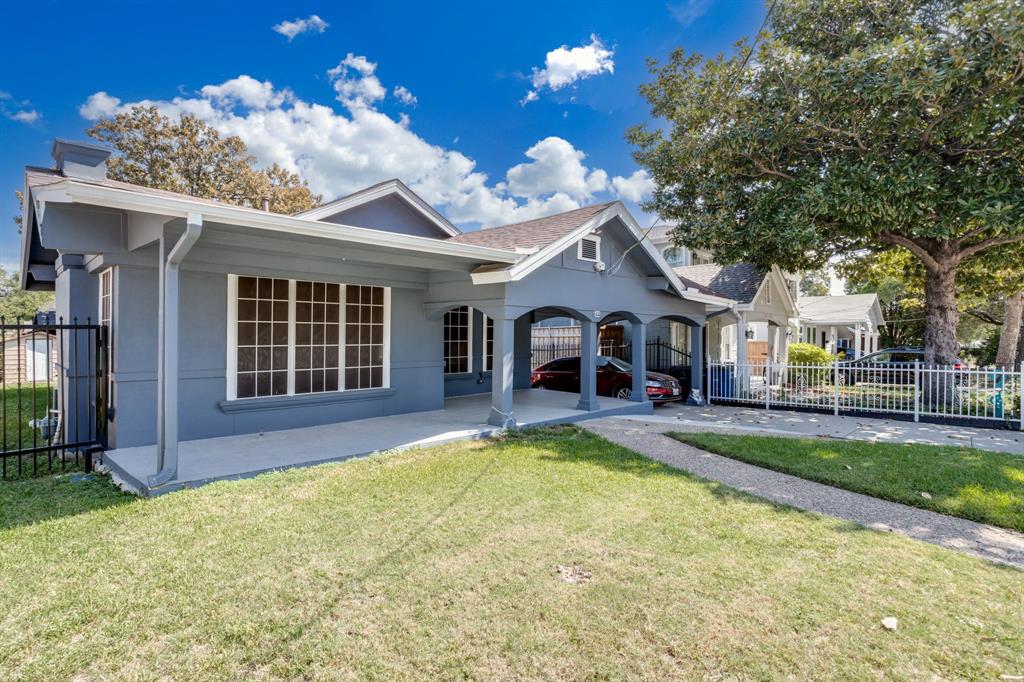 644 North Tyler Street Dallas, TX 75208 - Photo 3 of 33 a view of a house with swimming pool and a yard