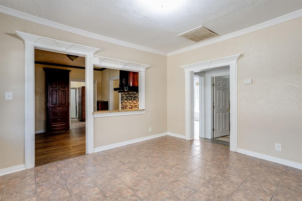 644 North Tyler Street Dallas, TX 75208 - Photo 8 of 33 wooden floor and view of an empty room