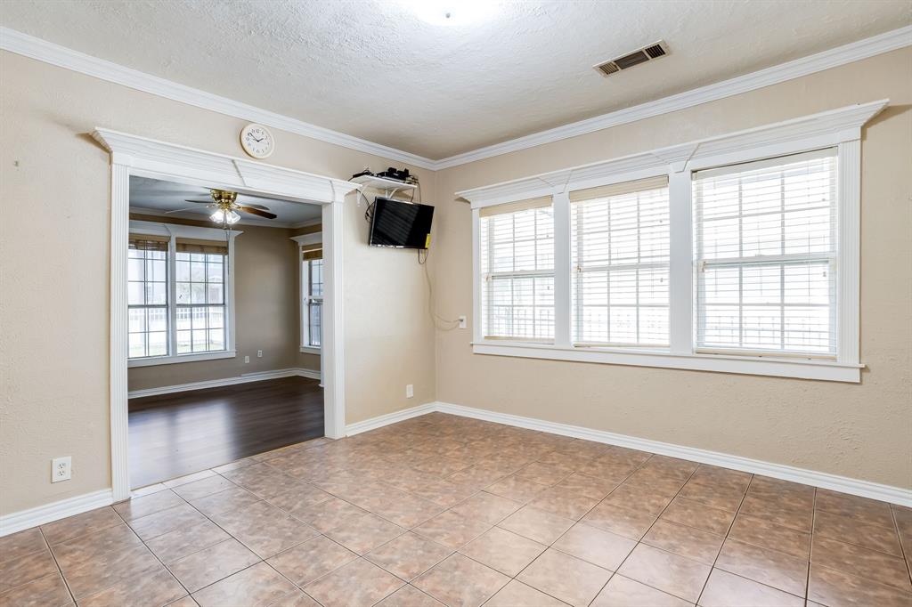 644 North Tyler Street Dallas, TX 75208 - Photo 9 of 33 a view of an empty room with a window