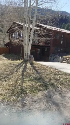 a view of a terrace with a yard