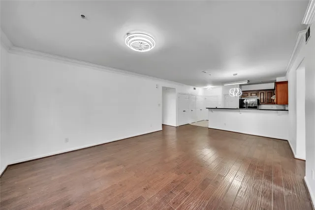 a view of a kitchen with a sink and a stove