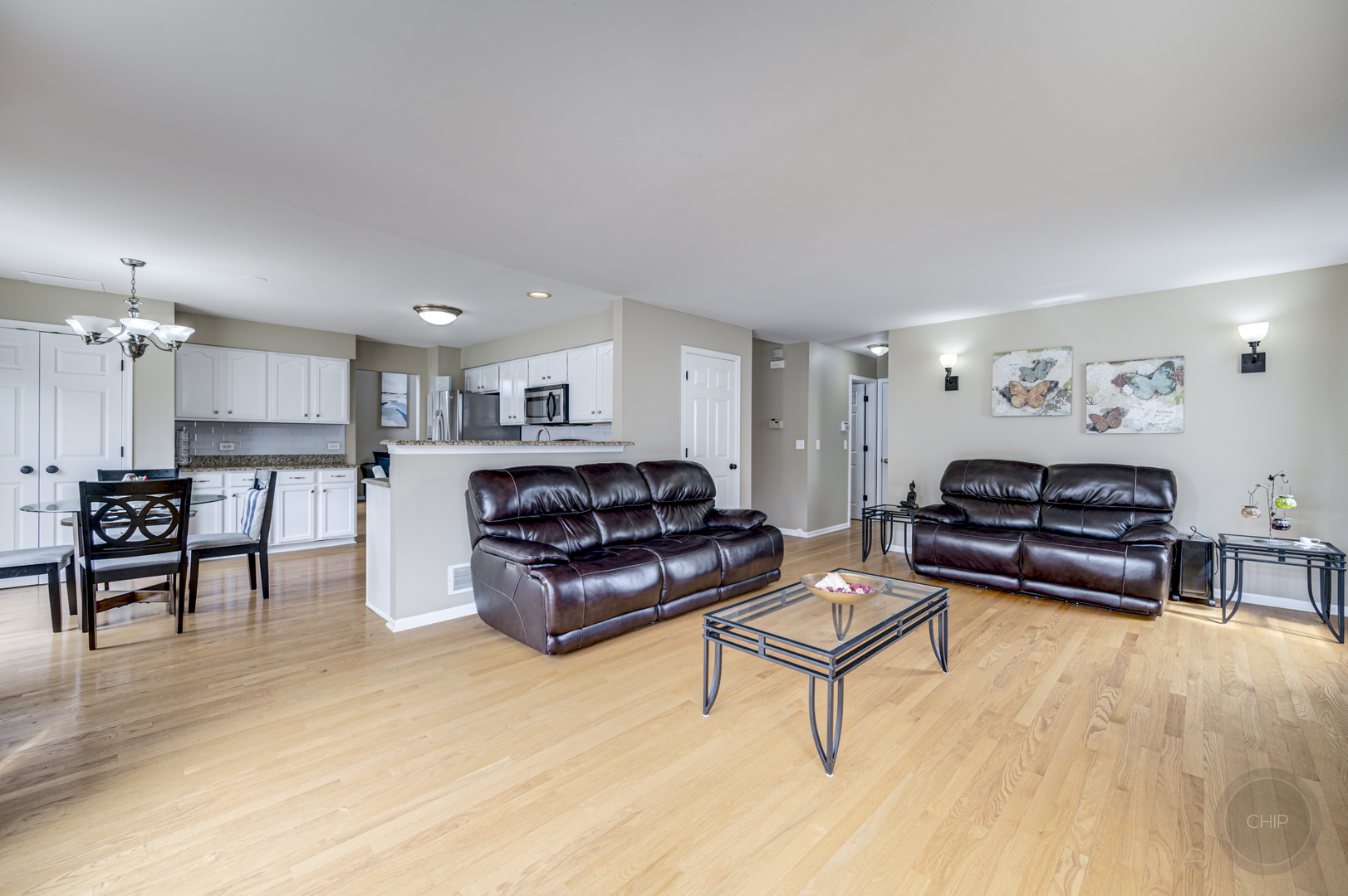 2135 Skylane Drive Naperville, IL 60564 - Photo 17 of 44 a living room with furniture and kitchen view