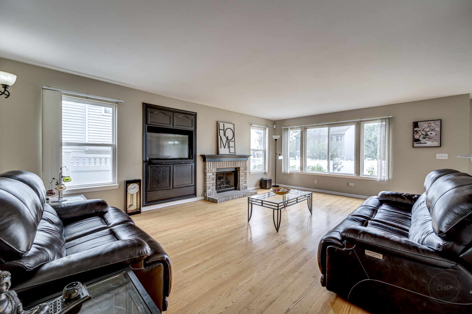 2135 Skylane Drive Naperville, IL 60564 - Photo 18 of 44 a living room with furniture fireplace and a window