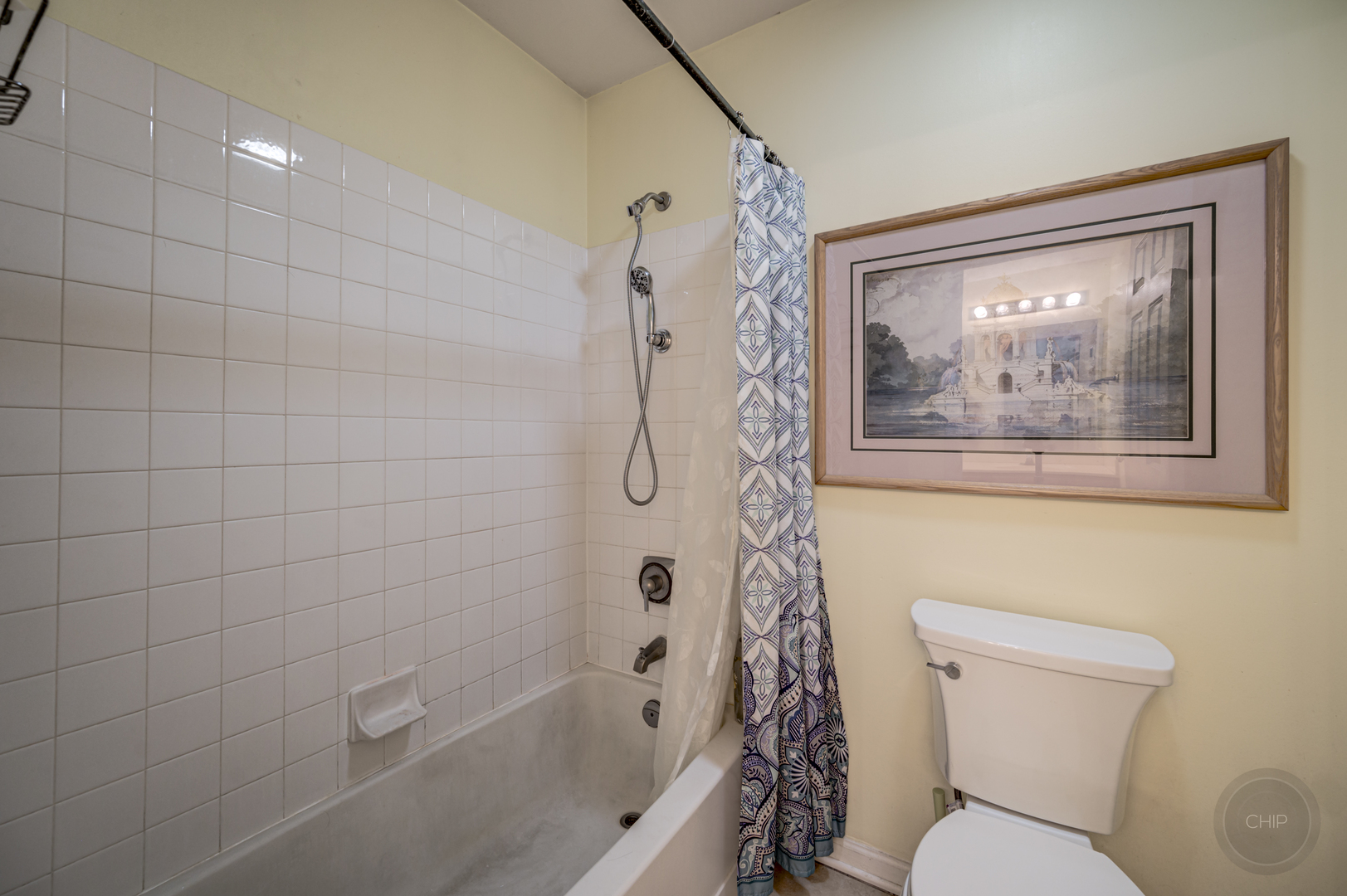 2135 Skylane Drive Naperville, IL 60564 - Photo 30 of 44 a bathroom with a toilet a sink and tub