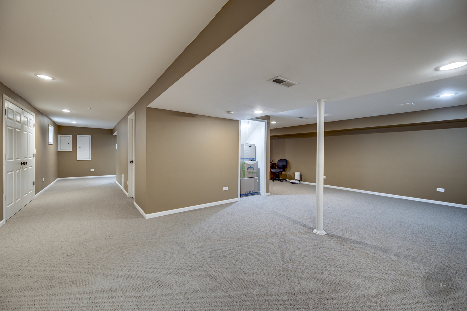 2135 Skylane Drive Naperville, IL 60564 - Photo 35 of 44 a view of a big room with closet and windows