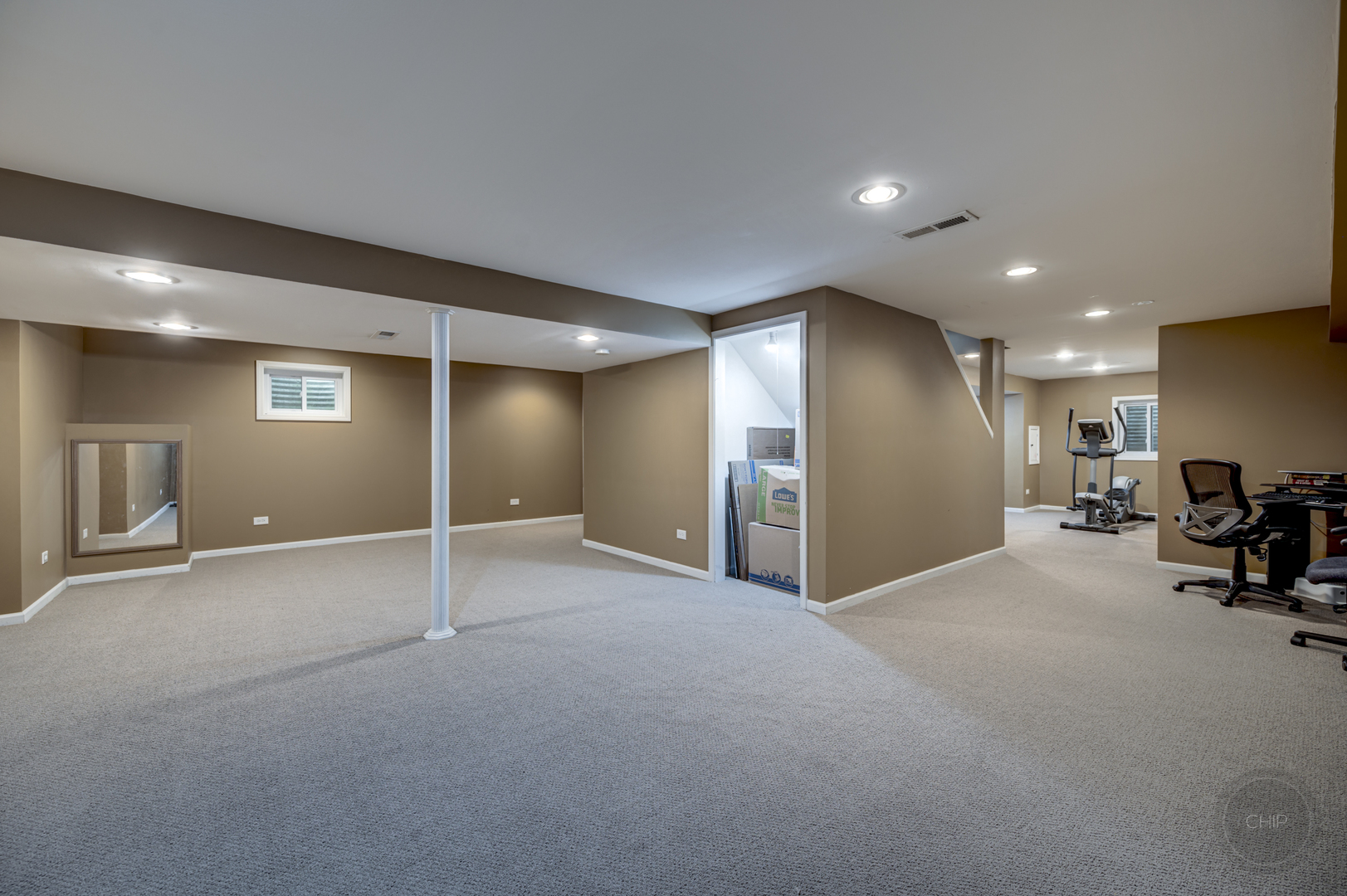 2135 Skylane Drive Naperville, IL 60564 - Photo 36 of 44 a view of a livingroom with a projector