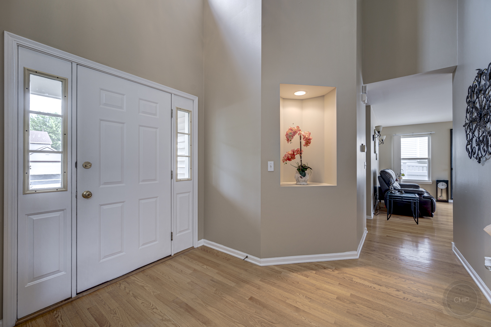 2135 Skylane Drive Naperville, IL 60564 - Photo 6 of 44 a view of a livingroom with wooden floor and furniture