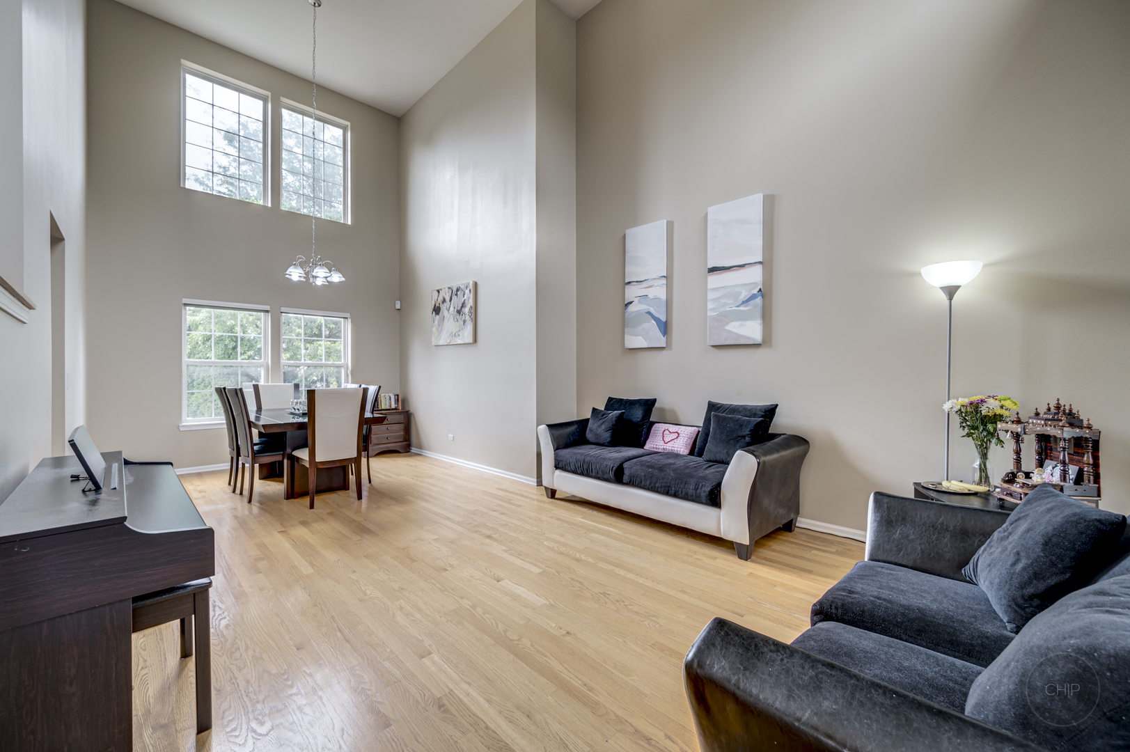 2135 Skylane Drive Naperville, IL 60564 - Photo 7 of 44 a living room with furniture and a large window