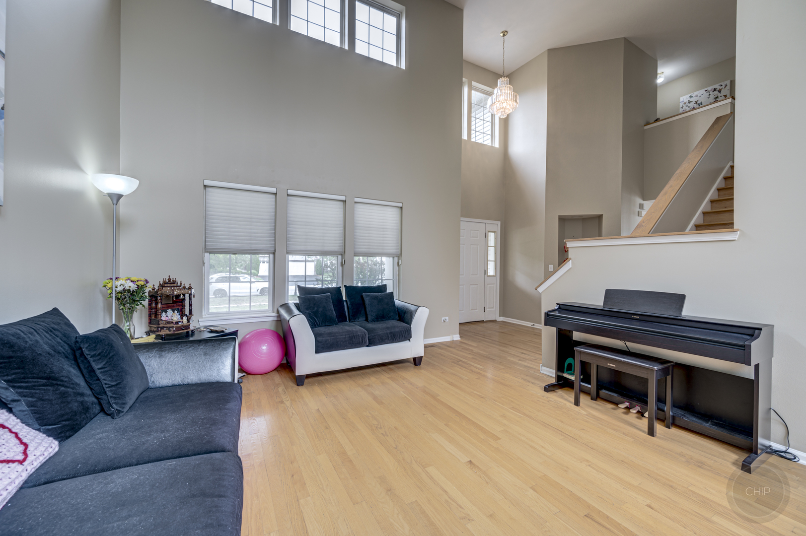 2135 Skylane Drive Naperville, IL 60564 - Photo 8 of 44 a bedroom with furniture and a window