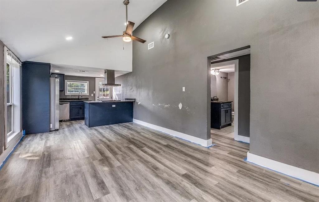 3914 Spring Avenue Dallas, TX 75210 - Photo 5 of 14 Kitchen area open to the living area perfect for families or entertaining