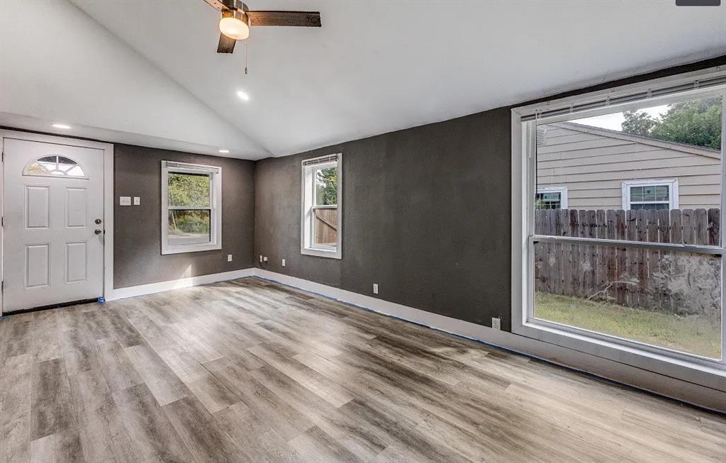 3914 Spring Avenue Dallas, TX 75210 - Photo 7 of 14 Large celling to floor window to allow tons of natural light