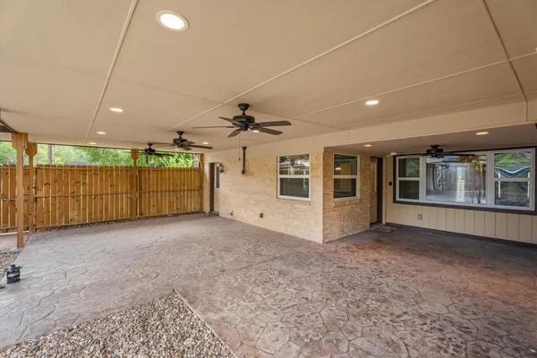 a backyard of a house with seating space