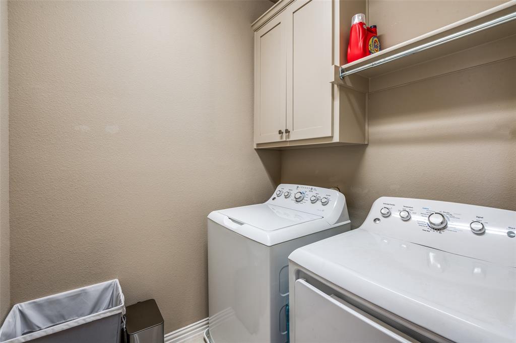 4665 Dozier Road, Unit C Carrollton, TX 75010 - Photo 10 of 26 a utility room with dryer and washer