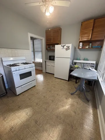a storage room with washer and dryer