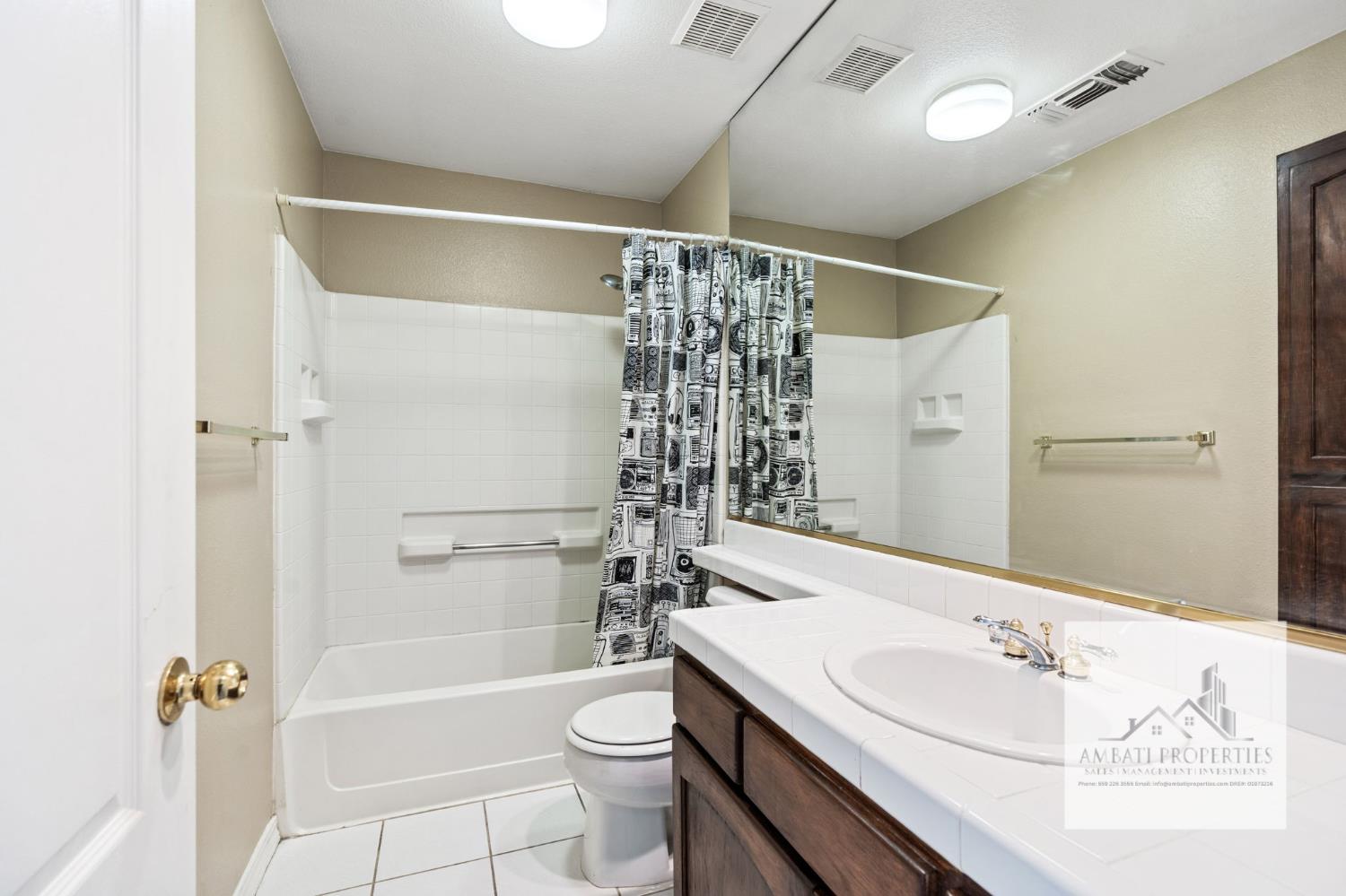 7577 North Trellis Circle Fresno, CA 93720 - Photo 11 of 11 a bathroom with a sink a toilet and shower