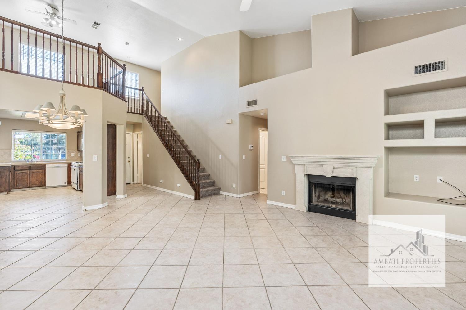 7577 North Trellis Circle Fresno, CA 93720 - Photo 2 of 11 a view of an entryway with a fireplace