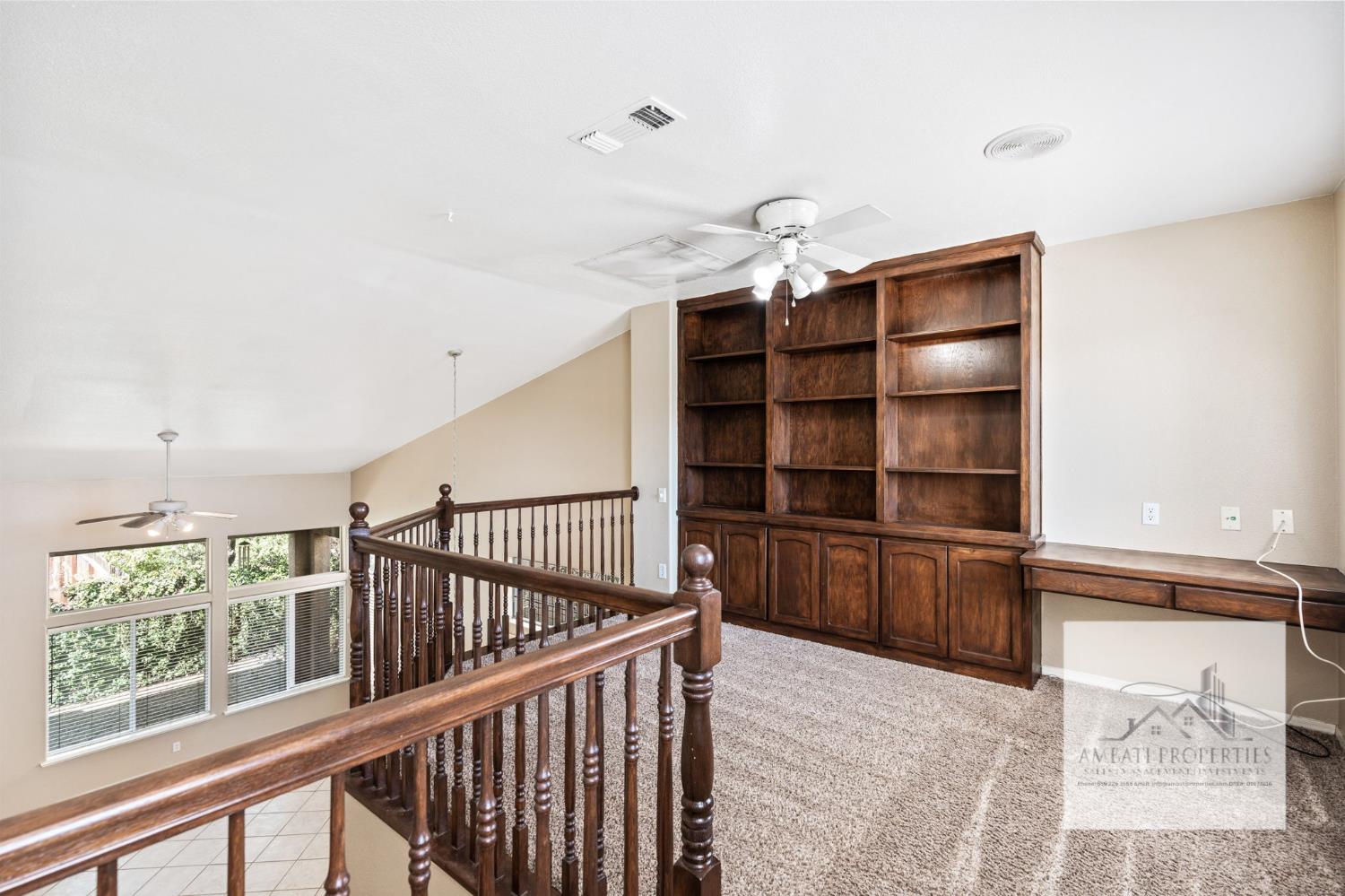 7577 North Trellis Circle Fresno, CA 93720 - Photo 6 of 11 a view of a hallway with furniture